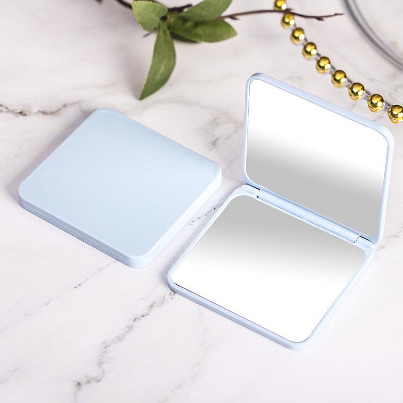 Compact Double-Sided Folding Makeup Mirror - Portable and Stylish for Students