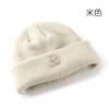 Women's Solid Color Letter Print R Rolled brim knitted hat for outdoor cycling, providing warmth, cold protection, and ear coverage