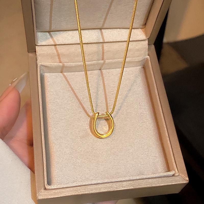 

Niche titanium steel necklace women s high-end temperament zircon pearl pendant sweater chain new accessories wholesale