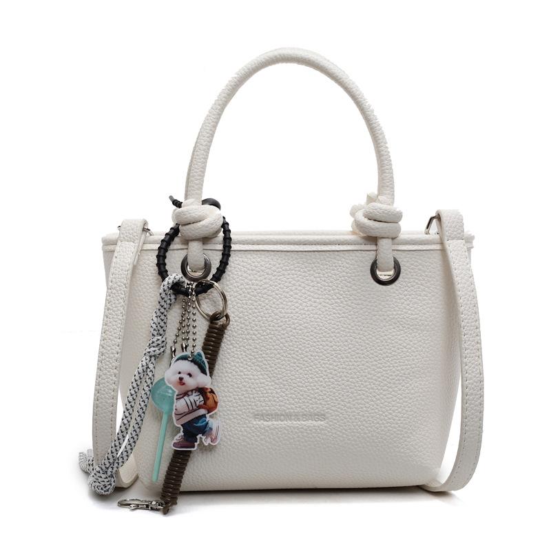 Hot-selling lychee pattern texture simple portable bucket bag Korean version casual temperament versatile commuter style messenger women's bag