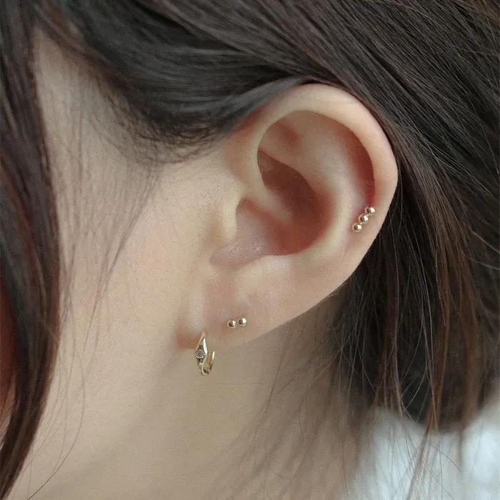 14k ball stick piercing