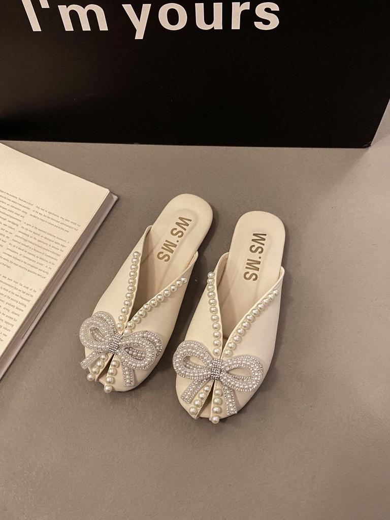 Bow pearl bag head slippers female Korean version round head breathable one pedal home slippers female hollow half slippers female