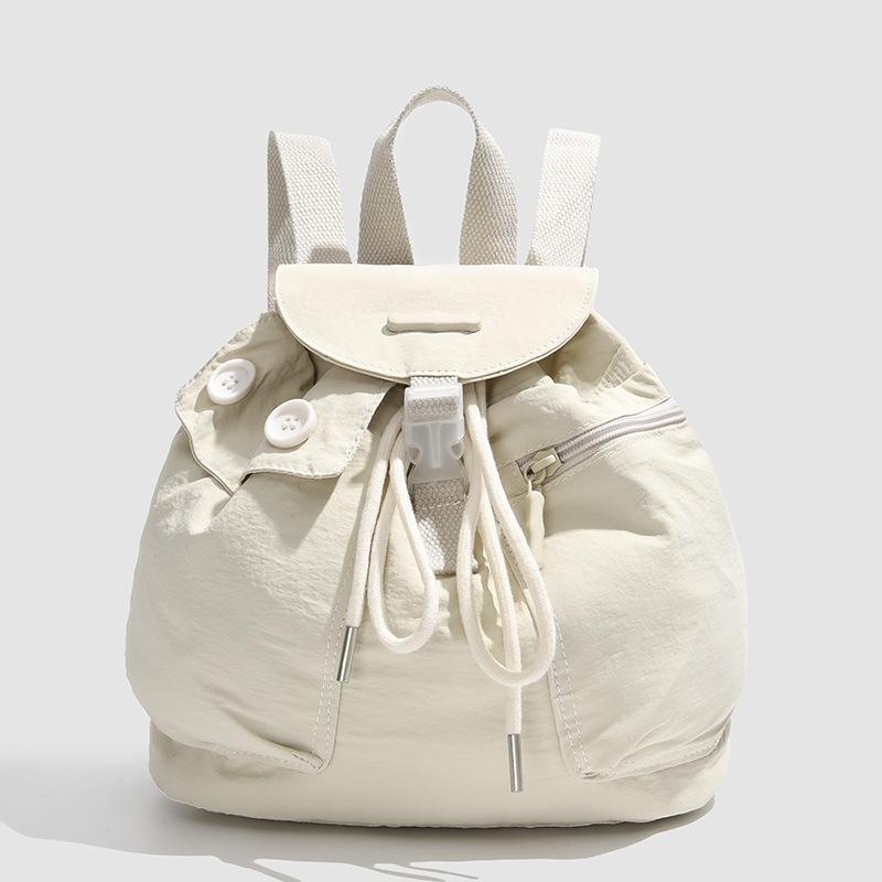 Schoolbag1011 new Korean ins women's niche design lightweight pocket button drawstring backpack outdoor nylon