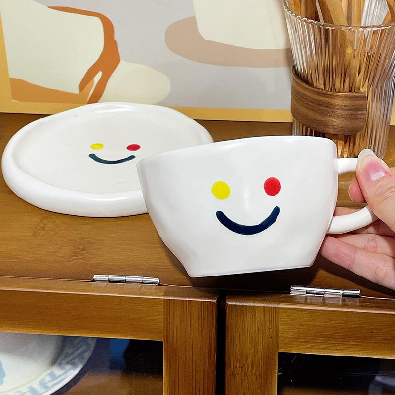 

Smiley face cup and saucer set Office coffee cup Girls afternoon tea drinking water ceramic cup 300ml