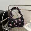 Gentle and sweet flower canvas bag women's new drawstring shoulder bag high value floral bow armpit bag
