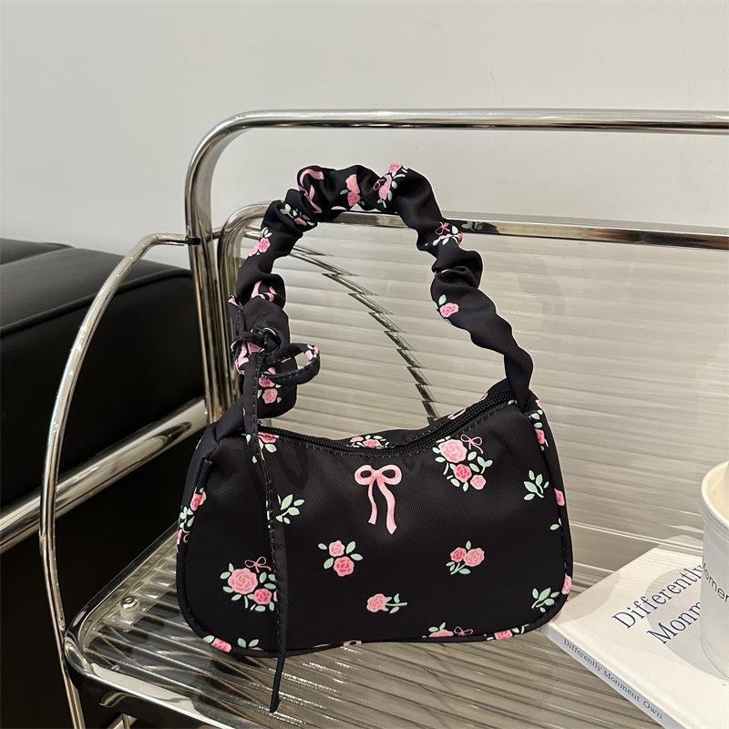 Gentle and sweet flower canvas bag women's new drawstring shoulder bag high value floral bow armpit bag