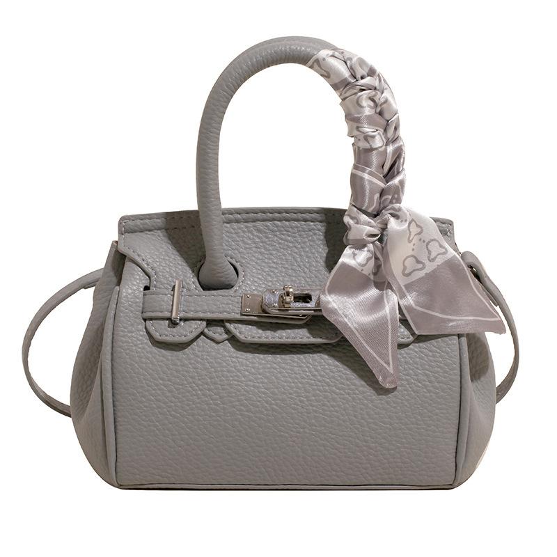 

Bag Women s 2025 New Fashion Trend Handbag Casual Versatile Shoulder Bag Niche Temperament Simple Kelly Bag 20*10*14 серый