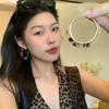 Maillard coffee amber earrings women's light luxury niche stud earrings commuter ear jewelry
