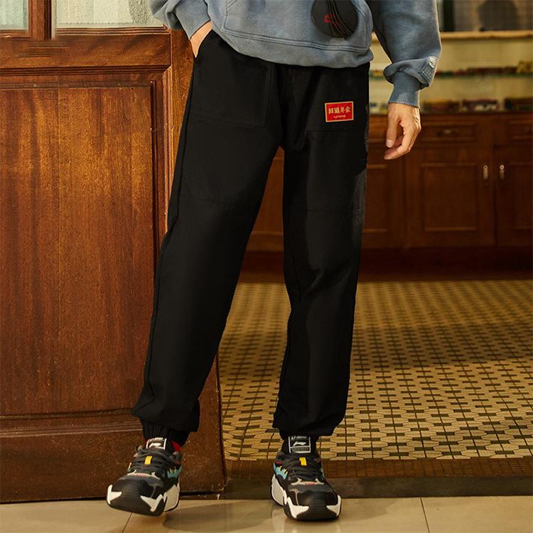 Li Ning Sports Lifestyle Series Trendy Solid Color Tapered Knit Joggers Unisex Joggers Black AKXS005-1