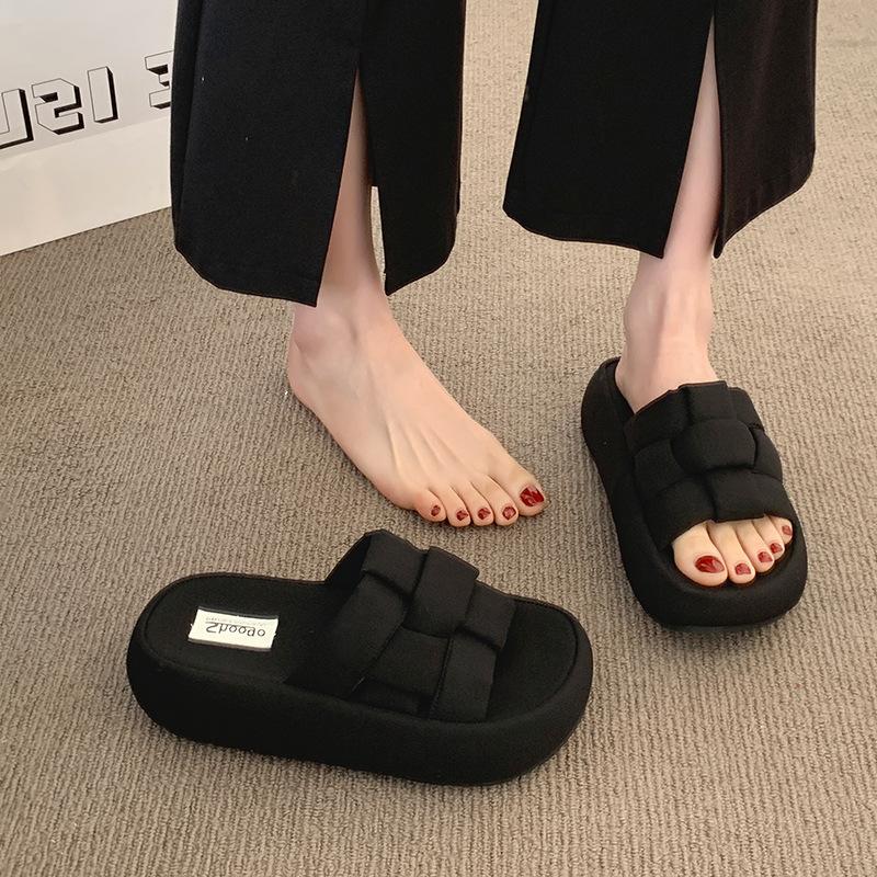 

Thick-soled slippers women s outer wear 2025 summer new Korean version woven non-slip one-word drag fashion fairy wind cool slippers 40 чёрный