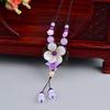 GEMCHIC Women's Ethnic Style Long Sweater Necklace with White Jade Flower Pendant, Retro Glass Beads Tassel Chain for Autumn Winter Fashion