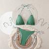 The new European and American triangle bag sexy bikini women's vacation two-piece swimsuit beach neck split swimsuit is on sale