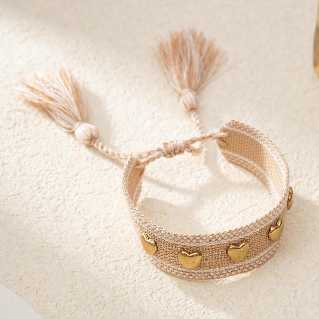 Gold Heart-Shaped Rivet Woven Friendship Bracelet with Tassel