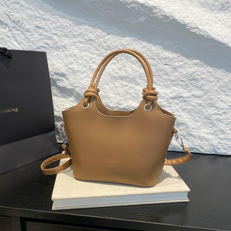 Neue Frühjahrs- und Sommermode vielseitige Pendler-Umhängetasche beliebte Textur Damentasche tragbare Bucket Bag