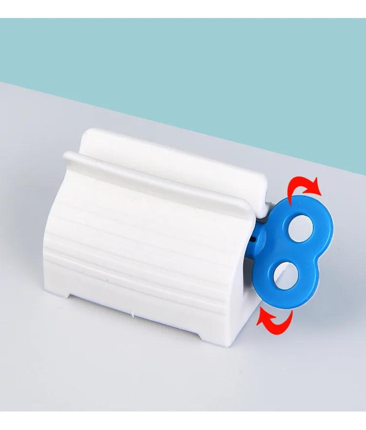 1pcs Random Color Rolling Tube Toothpaste Squeezer Toothpaste Seat Holder Stand Rotate Toothpaste Dispenser for Bathroom