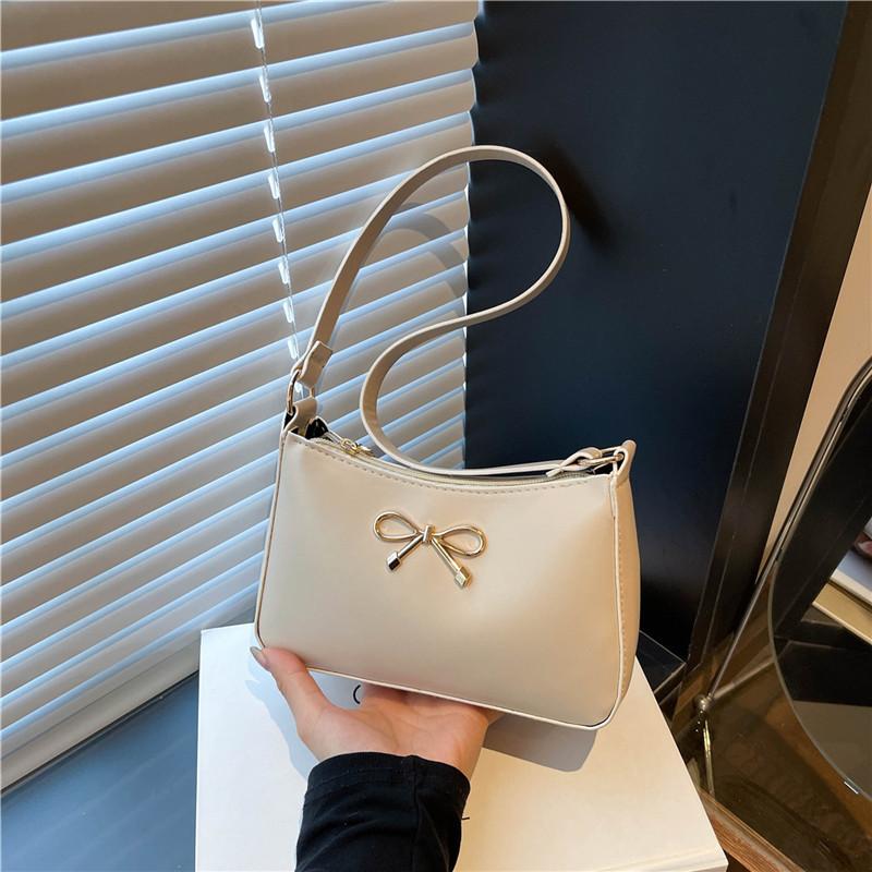 

2025 new beautiful high-end temperament niche single shoulder armpit bag summer popular versatile commuter handbag women хаки