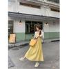 French small yellow suspender dress women's summer new waist temperament long dress seaside vacation skirt
