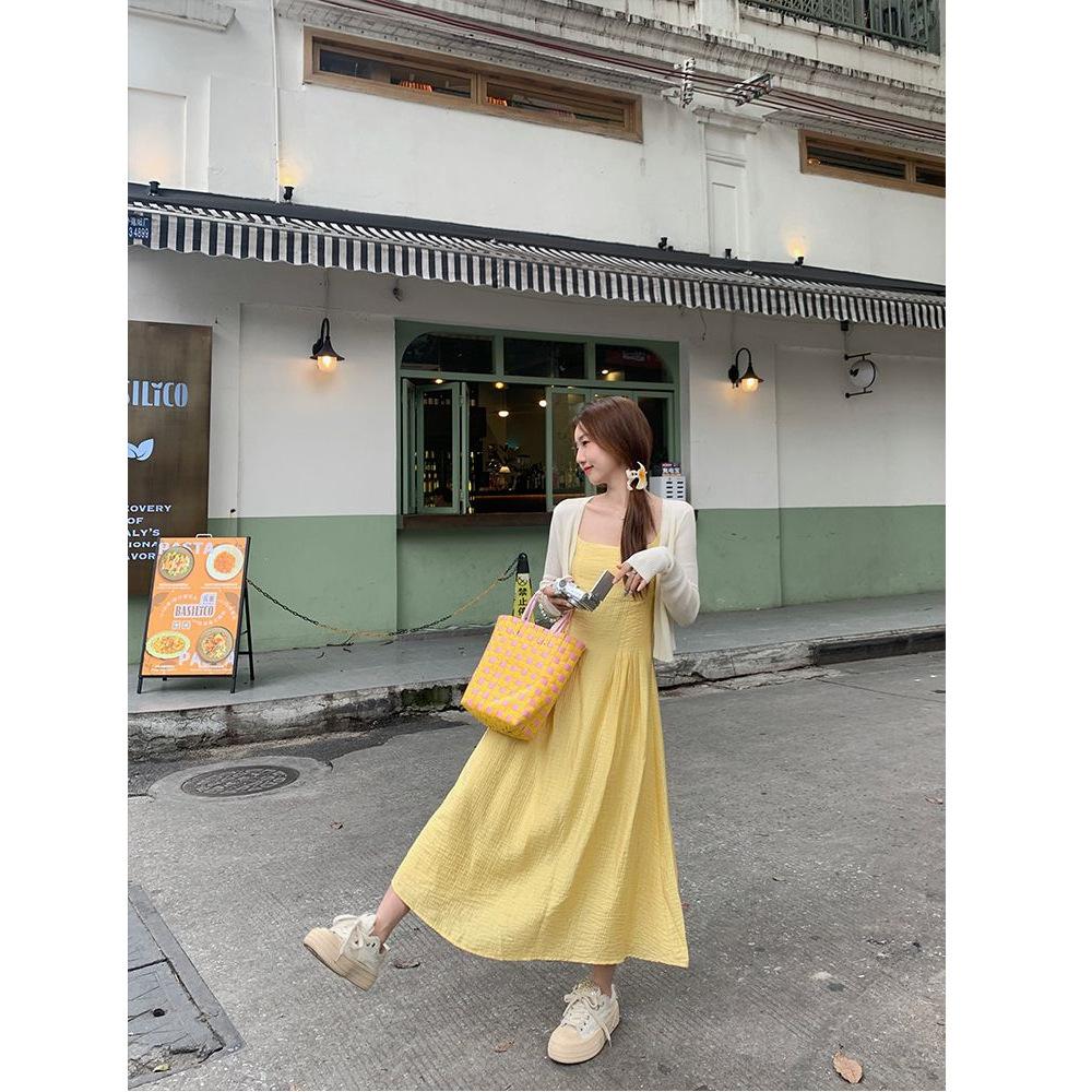 French small yellow suspender dress women's summer new waist temperament long dress seaside vacation skirt
