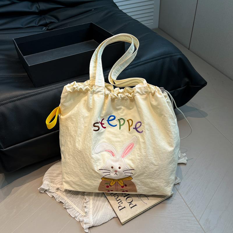 

Casual canvas bag Korean lazy style underarm bag 2025 new plaid tote bag cute cartoon shoulder bag бежевий
