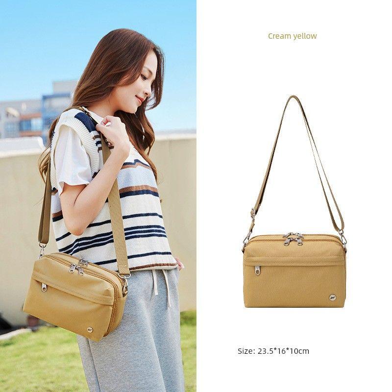 

Japan Letian Messenger Bag Women Travel Small Bag Lightweight Outdoor Mountaineering Passport Certificate Portable Leisure Shoulder Bag Cream yellow