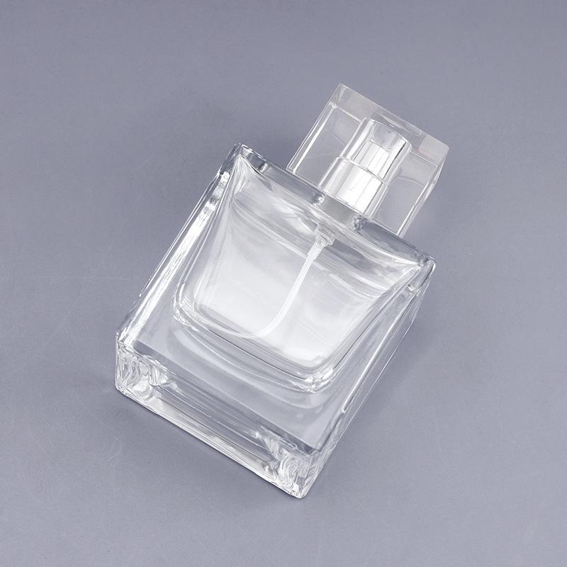 100ml 15-Hole Clear Glass Perfume Spray Bottle with Plastic Cap - Large Capacity & Portable
