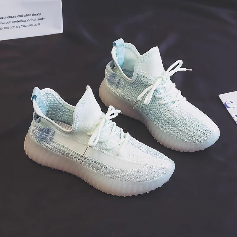 Chaussures noix de coco femmes 2025 printemps nouveau respirant couple chaussures homme et femme semelle souple antidérapante tissé à la mouche chaussures de sport de course légères