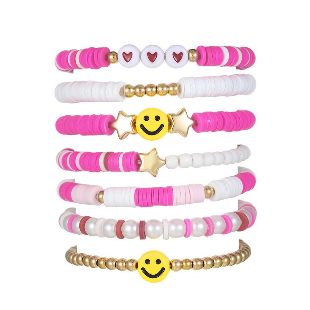 Korean version of fashion new multi-layer elastic thread soft pottery love smiley face bracelet set retro handmade pearl jewelry women