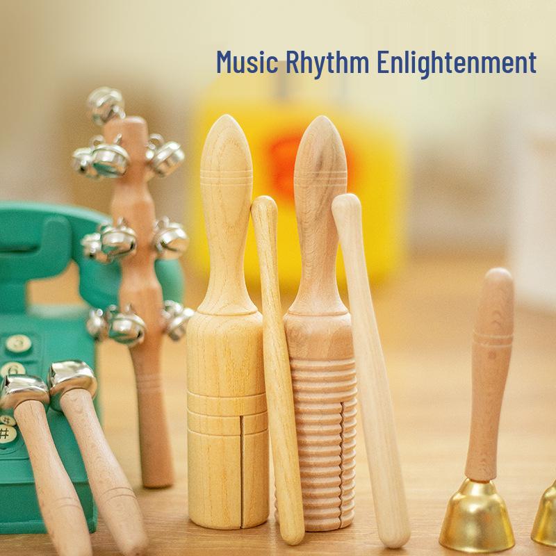 Orff Percussion Set: Claves, Castanets, Sand Shakers, Egg Shakers, Wrist Bells, Tambourine, Triangle, and Wood Block.