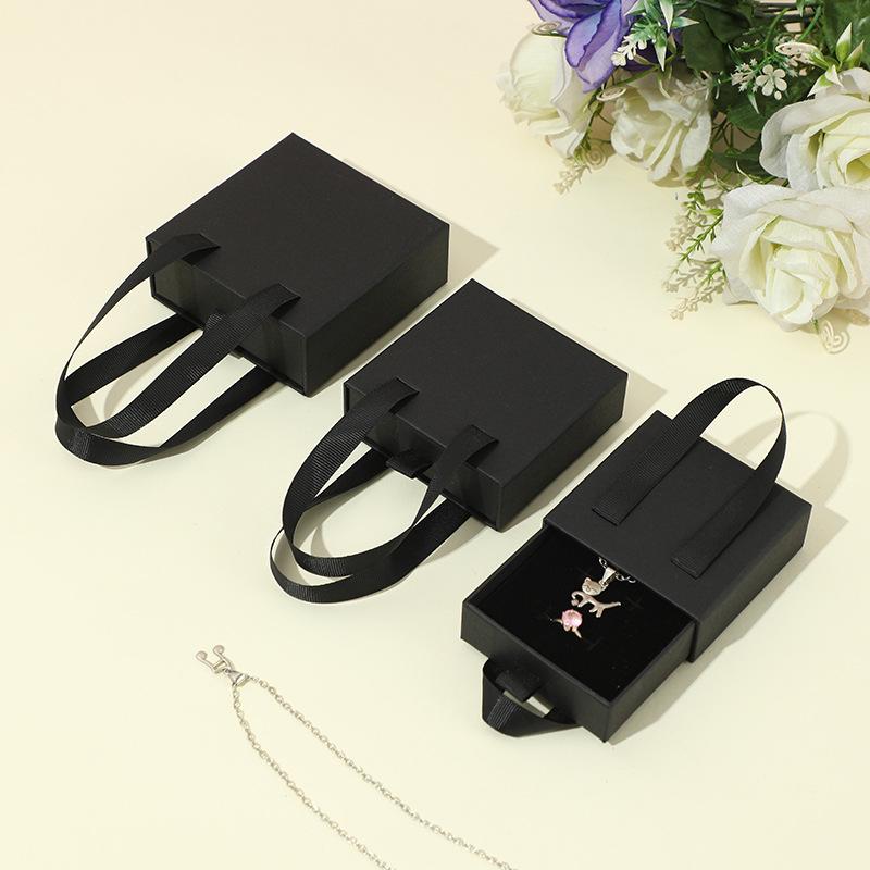 

Portable Jewelry Drawer Box: Packaging for Necklaces, Bracelets, Rings 9x9x3.2cm