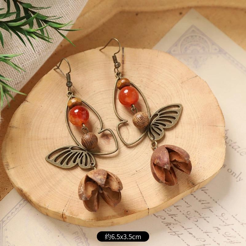 Retro niche literary earrings, natural plant fruits, wooden dried fruits, long fringed women's earrings