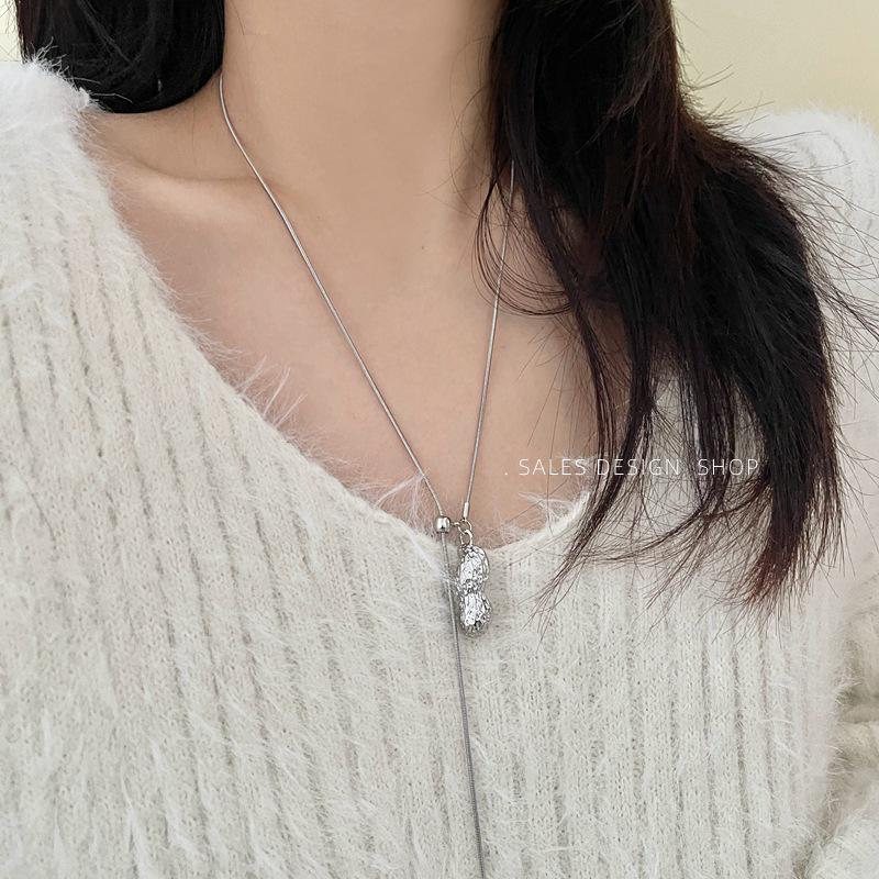 

Peanut Pendant Long Drawstring Sweater Chain - Versatile Cold Style Necklace for Daily Commute