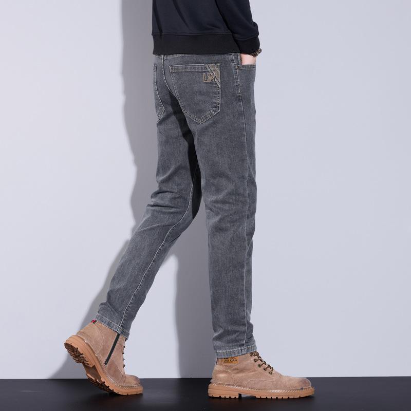 Jeans primaverili alla moda pantaloni da uomo giovanili casual e versatili elasticizzati dritti piccoli pantaloni in denim