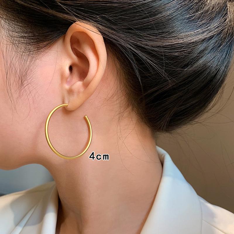 

Sterling silver frosted large circle earrings women s high-end sense European and American smooth fashionable earrings temperament plain ring earrings