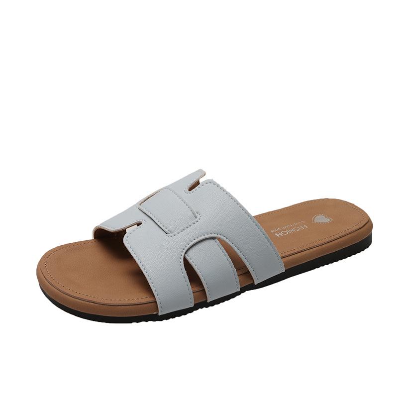 Versatile summer white outer slippers girl 2025 new niche fashion woven beach one-word drag fairy sandals