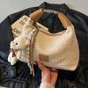 Woven straw bag women's 2025 new summer niche design messenger bag versatile high-end portable dumpling bag