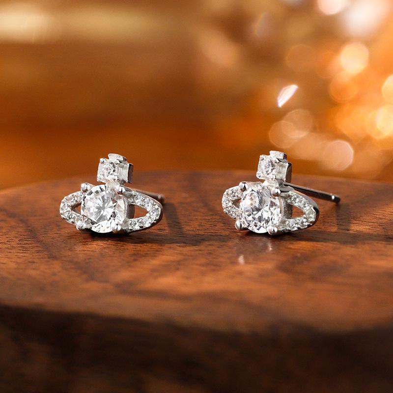 Ohrstecker Saturn aus S925 Sterlingsilber im koreanischen Stil für Damen - Mit Diamanten besetzt, super glänzend, kleines leicht luxuriöses Zirkon-Design