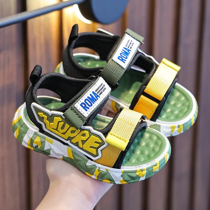 

Детские сандалии для мальчиков 2024 года, модные летние корейские повседневные нескользящие сандалии с мягкой подошвой для студентов и мальчиков, пляжные сандалии для детей 29 18CM зелёный