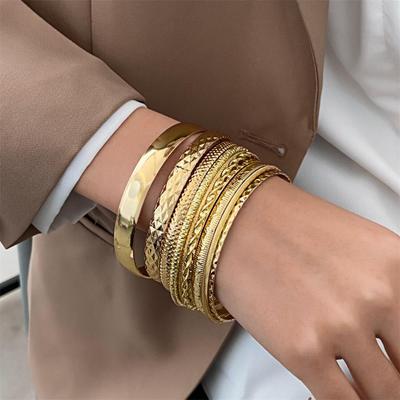 Set di Bracciali in Lega d'Oro Stile Etnico da Donna - Collezione di Braccialetti Retrò da Dieci Pezzi