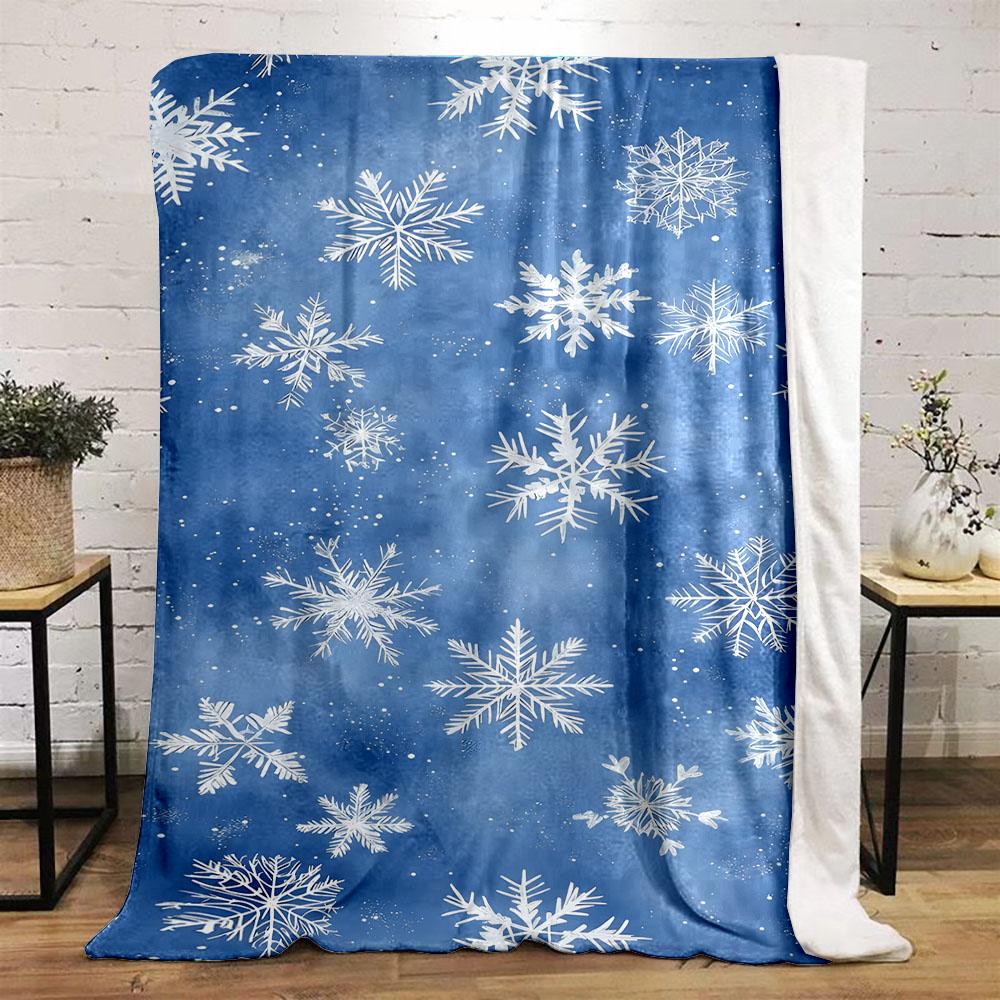Snowflakes on a Blue Winter Background Patterned flannel blanket perfect for the bedroom living room, sofa, or a little nap