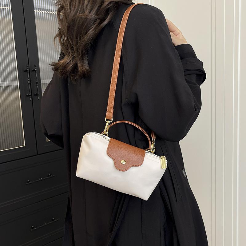 Niche machine bag nylon cloth portable dumpling bag new shoulder crossbody small bag hand change bag tide