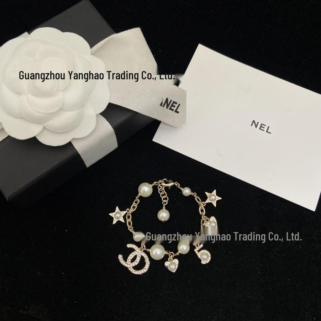 Seiko Elegantes Doppel C Perlen- & Diamant-Sternenherz-Armband für Damen