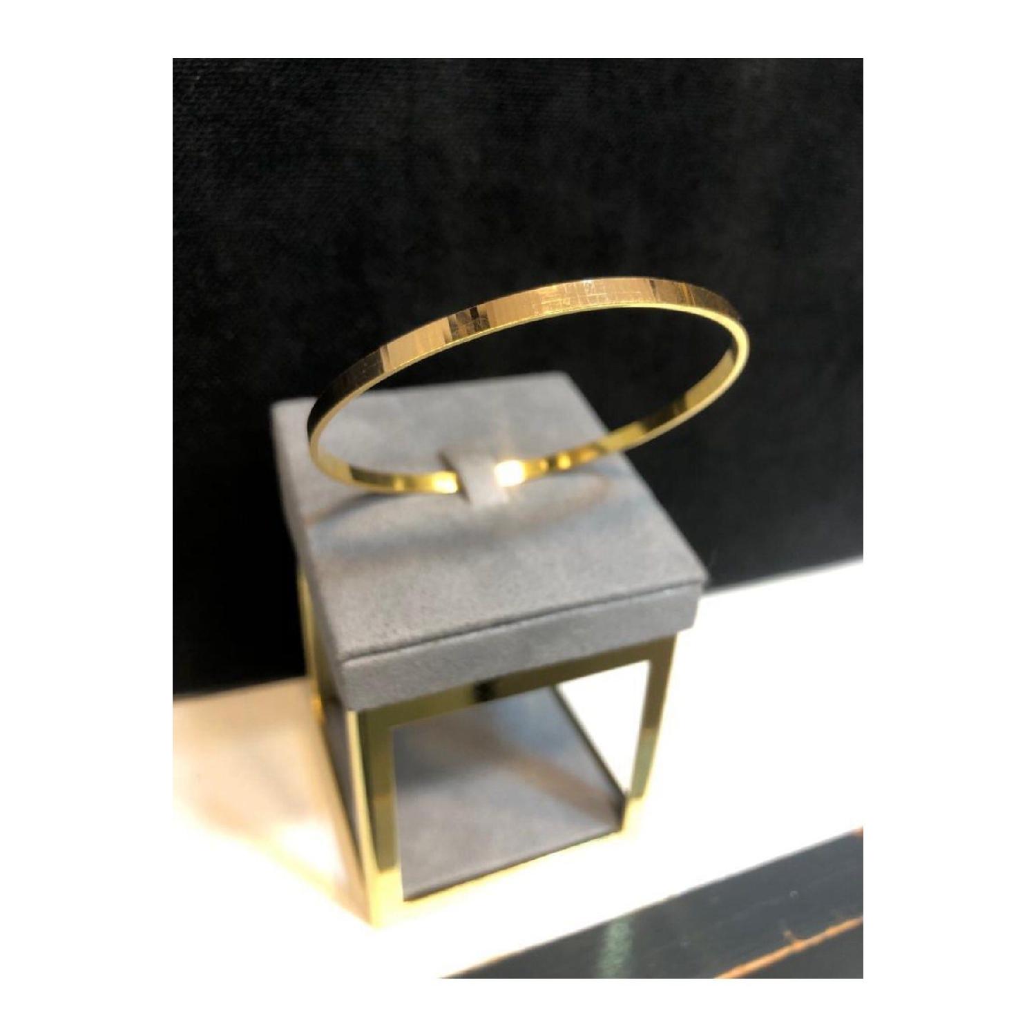 

Товстий браслет Ajda золотистого кольору, браслет 3154 золотий