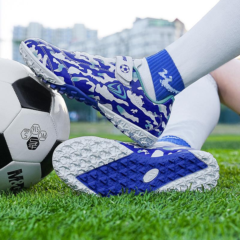 

Мальчики и девочки футбольные бутсы 2025 новые мальчики камуфляж липучка студентка женские шипованные соревновательные тренировочные бутсы 28