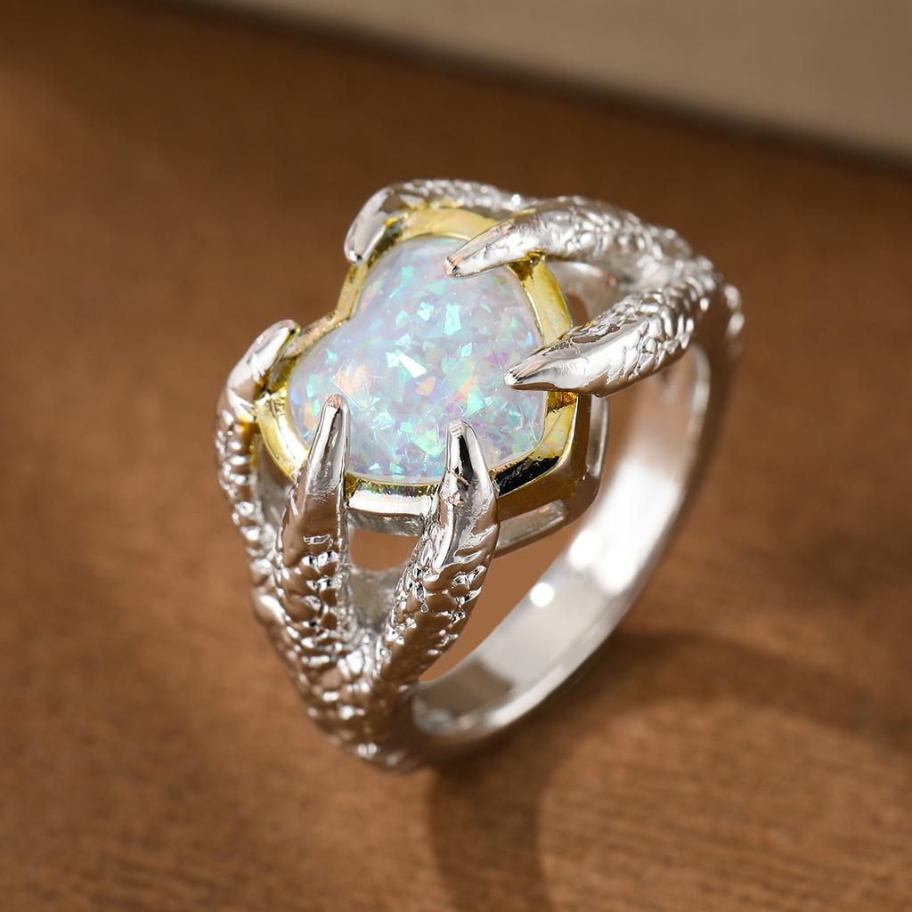 Fashion claw-set heart-shaped synthetic gemstone ring made of copper, for ladies' jewelry, suitable for parties and banquets.