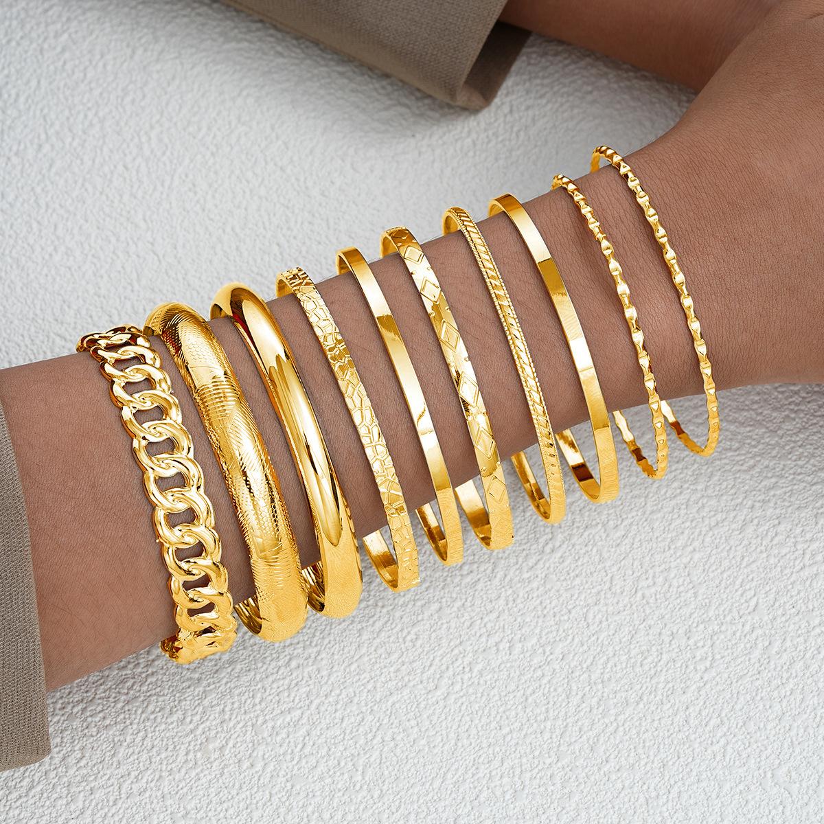

Набор из 10 предметов, Ретро личность, модный темперамент, преувеличенная комбинация, браслет для широкой руки, ювелирные изделия высокого класса. 10pcs золотой