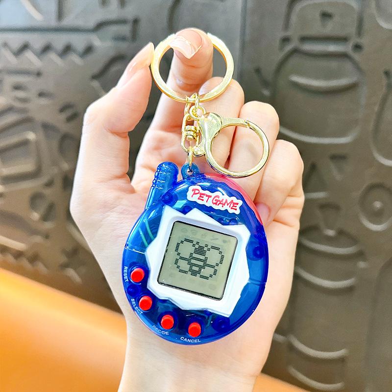 Breloc Creativ Mini Animal de Companie Electronic: Consolă de joc portabilă cu animal de companie virtual