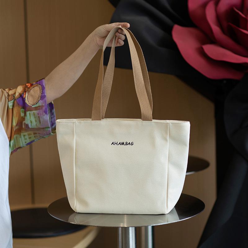 

2025 Women s Simple Large Capacity Canvas Tote for Students 38*12*33