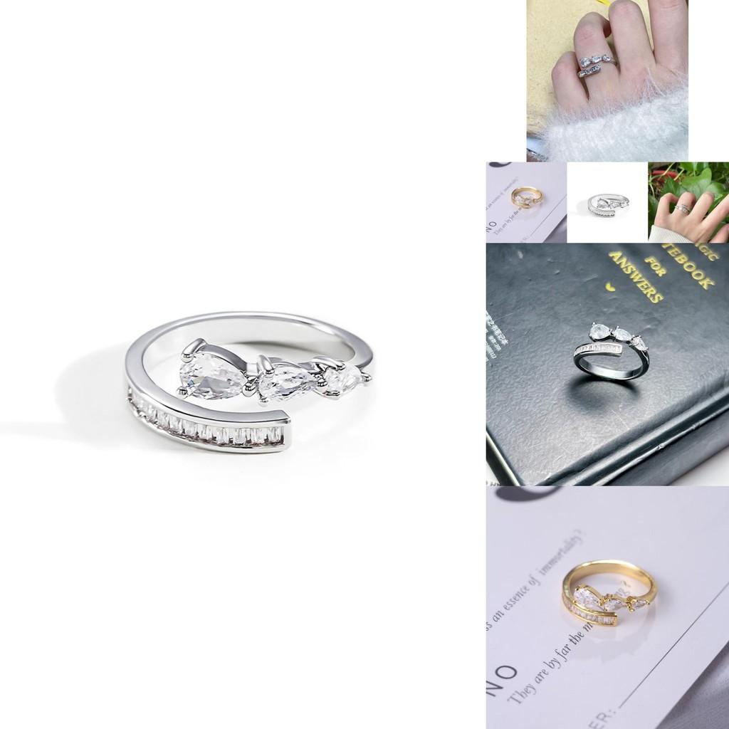 Stylish Women's Open Ring With Dazzling Zircon Stone Accents And Contemporary Water Drop Design