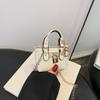 Mini quadratische Tasche Damen neue trendige vielseitige Schulter-Umhängetasche Nische leichte Luxus-Handtasche