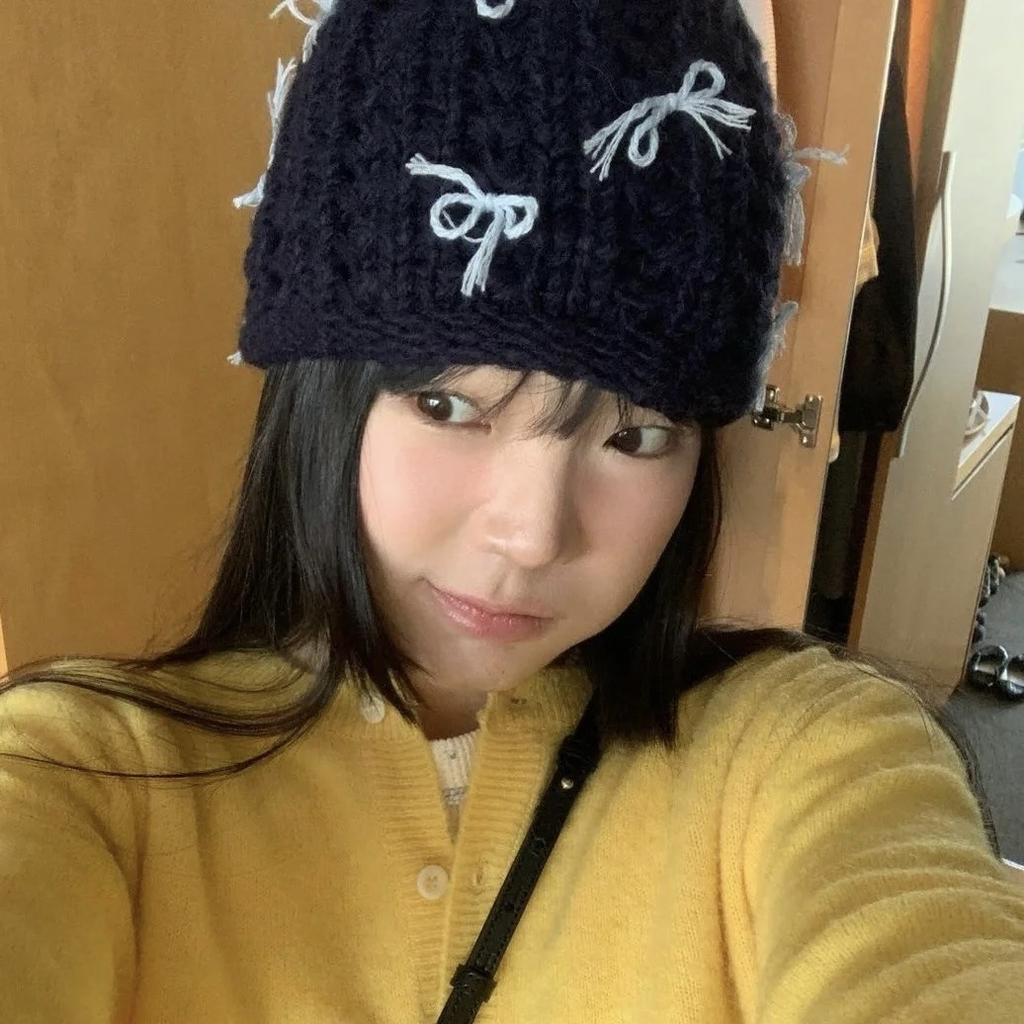 Autumn and winter crimped bow knitted bag head fashionable cold hat women's trendy new wool hat warm and sweet